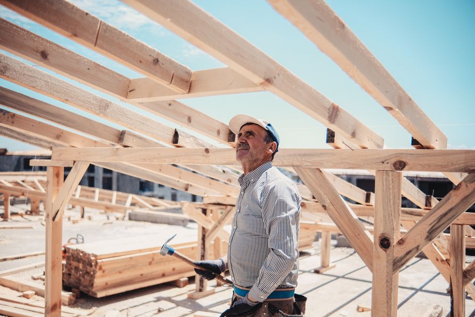 Construction worker building a house
