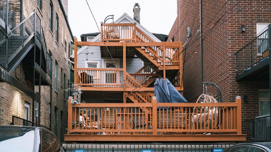 Wooden deck under construction in a backyard